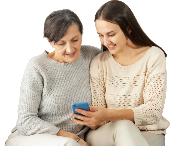 Mother and daughter looking and smartphone