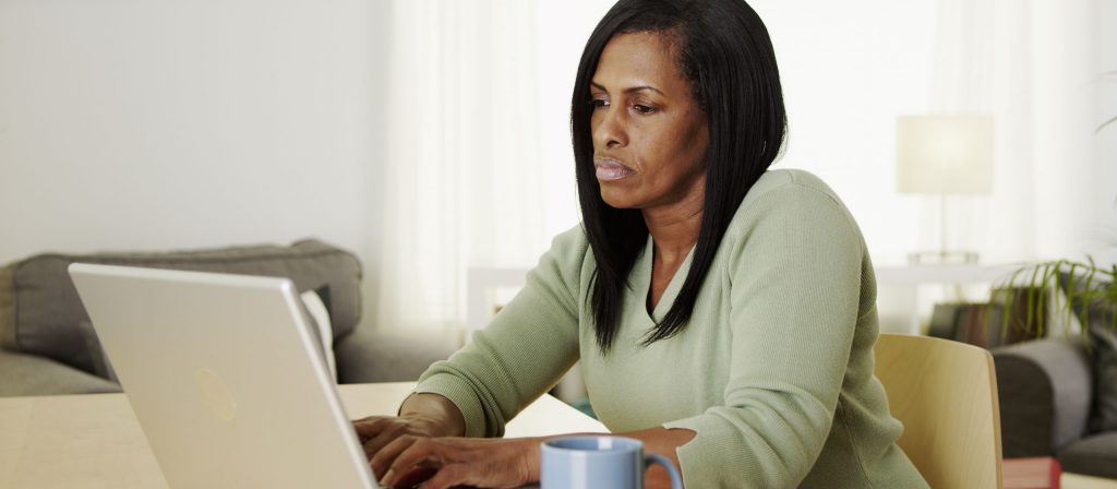 Middle-aged woman on laptop